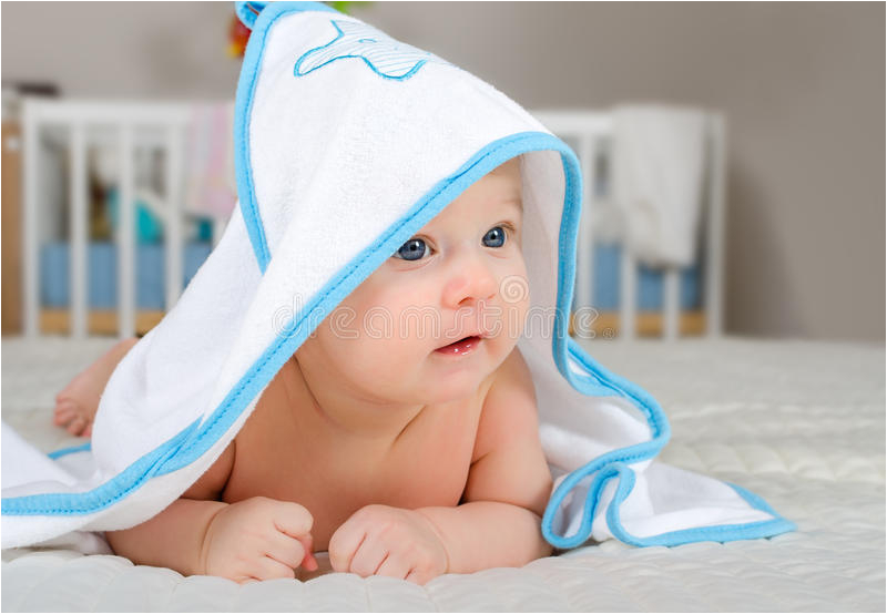 Little Baby Bathtub Cute Baby Boy In A Hooded towel after Bath Stock Image