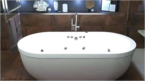 kohler freestanding whirlpool tub water jets and oval shape with integrated arm rest of the bath bathtub 4