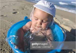 Baby Bath Seat 5 Month Old 5 Month Old Baby Taking A Bath In A Bucket Water the