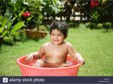 Baby Bath Tub 1 Year Old E and Half Year Old Baby Sitting In Red Plastic Tub with