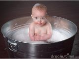 Baby Bath Tub Jacuzzi Baby Bathing In Galvanized Tub Bubbles Stock