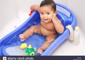 Baby Bath Tub with Legs Girl Washing Feet Stock S & Girl Washing Feet Stock
