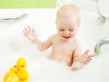 Baby Bathtub Blocker Kid toddler Playing with Building Block toys Stock Image