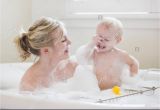 Baby Bathtub Bubbles Mother and Baby Taking A Bubble Bath Stock