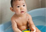 Baby Bathtub for 3 Month 8 Month Old asian Baby Girl Having Fun Playing with Water