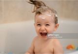 Baby Bathtub Laughing Baby Laughing In Bathtub with Crazy Hair Stock