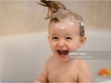 Baby Bathtub Laughing Baby Laughing In Bathtub with Crazy Hair Stock