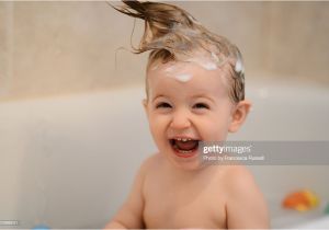 Baby Bathtub Laughing Baby Laughing In Bathtub with Crazy Hair Stock