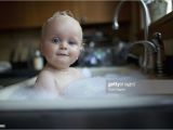 Baby Boy Bathtubs Infant Boy Takes A Bath In Kitchen Sink Stock