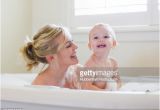 Baby Girl Bathtubs Mother and Baby Taking A Bubble Bath Stock