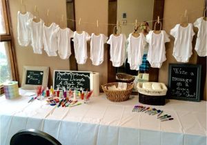 Baby Shower Decor Kits This Activity Table Included A Onesie Decorating Station Mommy