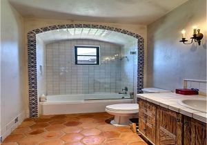 Bathtub Alcove Tiling Ideas An Arched Alcove Edged with Artisan Tile Surrounds the Tub