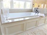 Bathtub Granite Surround Traditional Master Bathroom with White Underscore