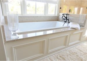 Bathtub Granite Surround Traditional Master Bathroom with White Underscore