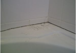 Bathtub Surround Caulking is It Grout or Caulking What is the Difference