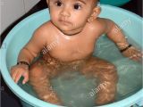 Bathtubs India south asian Indian Baby Taking Bath In Tub Bathroom