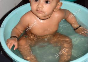 Bathtubs India south asian Indian Baby Taking Bath In Tub Bathroom