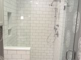 Best Grout for River Rock Shower Floor Tiling by Santana Com Third Ward Walk In Shower with Half Wall