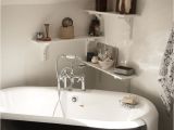 Clawfoot Tub Rack Claw Foot Tub and Shelves In A Corner