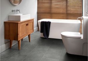 Commercial Rubber Flooring Bathroom Featuring Secura Pur Luxury Vinyl Sheet Flooring In