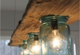 Driftwood Light Fixture 34 Driftwood Crafts to Give A Beachy Feel to Your Home Arts