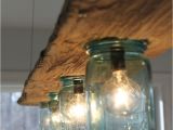 Driftwood Light Fixture 34 Driftwood Crafts to Give A Beachy Feel to Your Home Arts