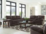 Early American sofas for Sale Reyes Chocolate Lay Flat Reclining Group