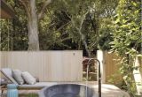 Freestanding Bathtub Garden A Serene Outdoor Bathing area Features A Barcelona Tub by