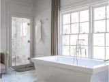 Freestanding Grey Bath Tub Spa Bathtub with White Marble Diamond Pattern Tile Floor