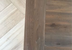 Grey Stick Down Flooring Floor Transition Laminate to Herringbone Tile Pattern Model