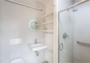 How Much Does A Tile Shower Cost In the Guest Bathroom Penny Tiles Have Been Chosen for their Cost