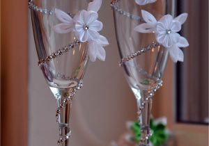 How to Decorate Bride and Groom Champagne Glasses Maybe Just One Flower On the Brides Haha but the Diamonds are An