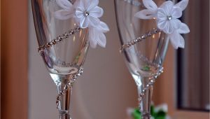How to Decorate Champagne Glasses Maybe Just One Flower On the Brides Haha but the Diamonds are An