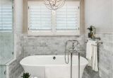 Install A Freestanding Bathtub Bathroom with Marble Tiles and Freestanding Tub Ways to