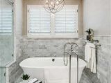Install A Freestanding Bathtub Bathroom with Marble Tiles and Freestanding Tub Ways to
