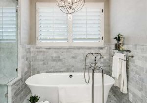 Install A Freestanding Bathtub Bathroom with Marble Tiles and Freestanding Tub Ways to