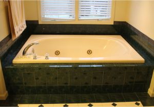 Jetted Bathtub Maintenance where is the Motor Located for This Jacuzzi Whirlpool Tub