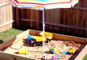 Kidkraft Backyard Sandbox 00130 Use Beach Umbrella to Provide Shade Over the Sandbox to Secure Use