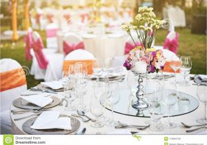 Light Pink Table Cloth Wedding Reception Dinner Table Setting Outdoors with Warm Light