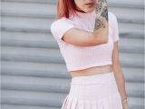 Light Purple Crop top Le Happy Wearing A Pastel Pink Tennis Skirt and Unif Crop top