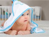 Little Baby Bathtub Cute Baby Boy In A Hooded towel after Bath Stock Image