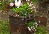 Making Garden Art From Old Dishes Flower Wood Stoves Garden Old Wood Stove by Ravenwingphotography