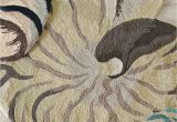 Nautical Round Rugs Add A Splash Of Seaside Style with Our Spiraling Shell Shaped Rug