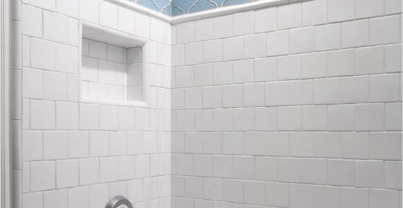 Near Bathtubs Large This Traditional White Tile Shower Features A Blue