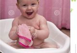 Newborn Baby Girl Bathtub Cute Smiling Baby Girl In the Bathtub Stock Graphy
