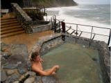 Outdoor Bathtub Big Sur Man soaking Bathing Watching Winter Storm Over Ocean
