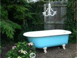Outdoor Clawfoot Bathtub Antique Clan Foot Cast Iron Tub Adorned with Repurposed