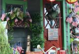 Patriotic Outdoor Decor Celebrating the Red White and Blue Potting Shed Decorated for