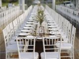 Renting Tables and Chairs San Diego White Tiffany Chairs Marquee Structure Integrated Timber Flooring