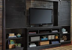 Sharlowe Entertainment Center with Wide Fireplace Insert Sharlowe Dark Finish Wall Unit with Bridge Piers W Barn Style Sliding Doors by Signature Design by ashley at Royal Furniture
